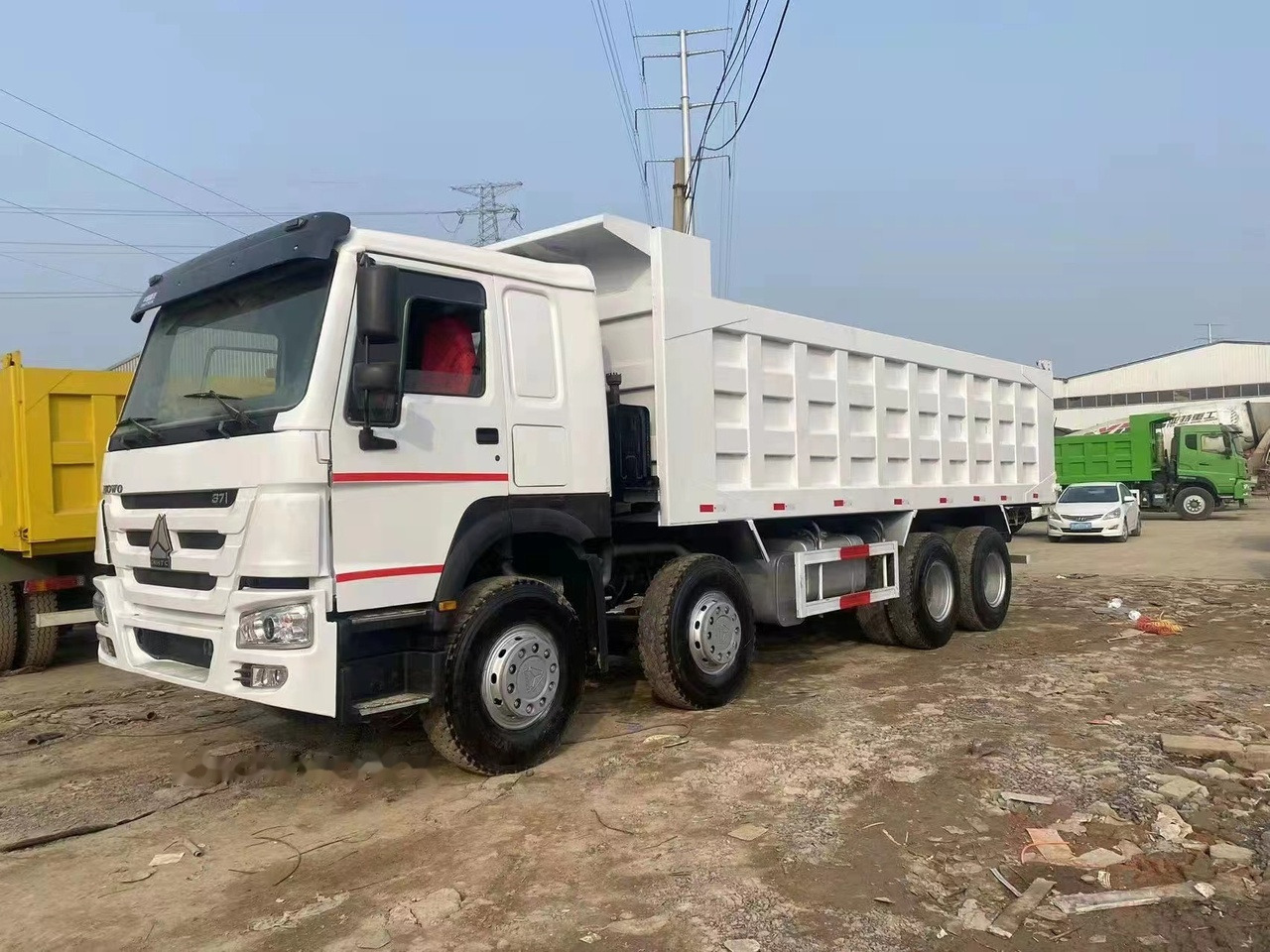 SINOTRUK HOWO 371 Tipper truck - Camião basculante: foto 1 SINOTRUK HOWO 371 Tipper truck - Camião basculante: foto 1