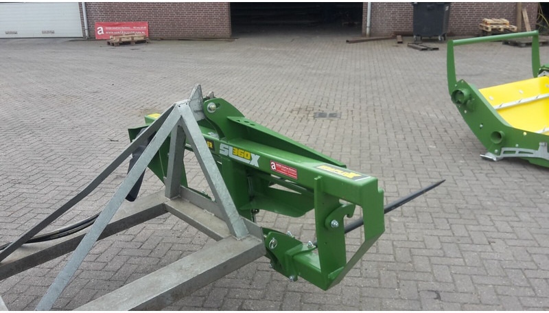 Hustler Balenafwikkelaar - Garra por Máquina agrícola: foto 4 Hustler Balenafwikkelaar - Garra por Máquina agrícola: foto 4