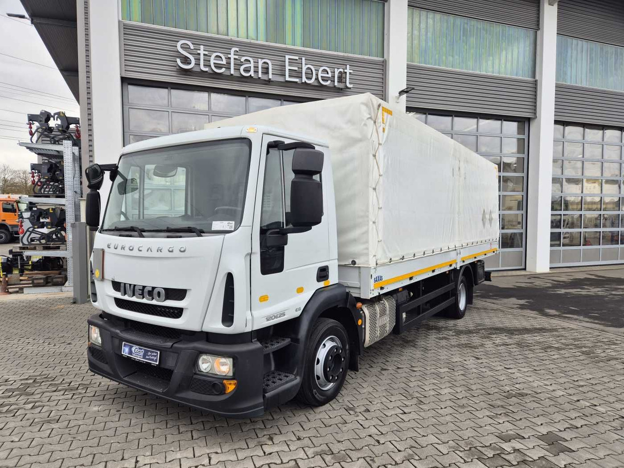 Iveco Eurocargo ML120E25 4x2 AHK Differenzial - Camião de lona: foto 1 Iveco Eurocargo ML120E25 4x2 AHK Differenzial - Camião de lona: foto 1