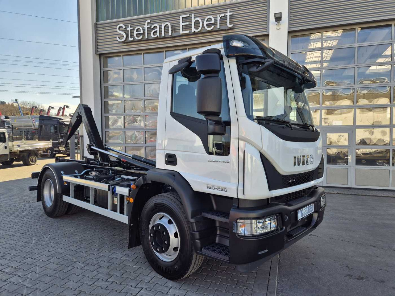 Iveco Eurocargo ML160E25/P HIAB Multilift XR10S4150 - Camião polibenne: foto 1 Iveco Eurocargo ML160E25/P HIAB Multilift XR10S4150 - Camião polibenne: foto 1
