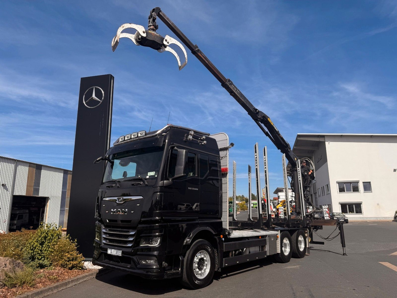 MAN TGX 33.640 6x4 BL Palfinger Q150Z96 - Camião de transporte de madeira, Camião grua: foto 2 MAN TGX 33.640 6x4 BL Palfinger Q150Z96 - Camião de transporte de madeira, Camião grua: foto 2