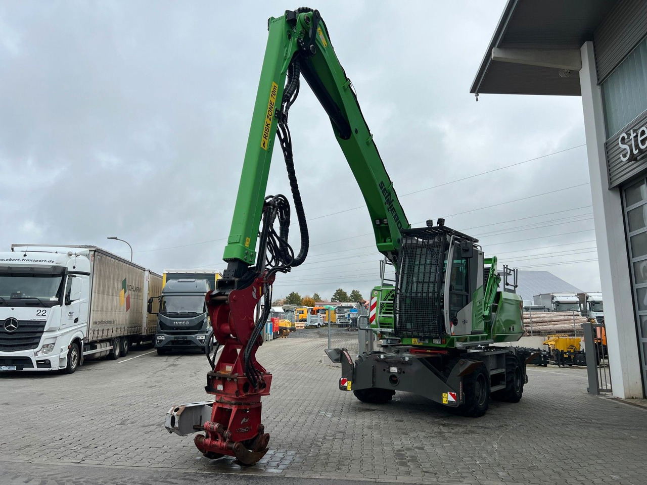 Sennebogen 718 / inkl. Vosch Fällzange / nur 1.965h! - Escavadeira de rodas: foto 5 Sennebogen 718 / inkl. Vosch Fällzange / nur 1.965h! - Escavadeira de rodas: foto 5