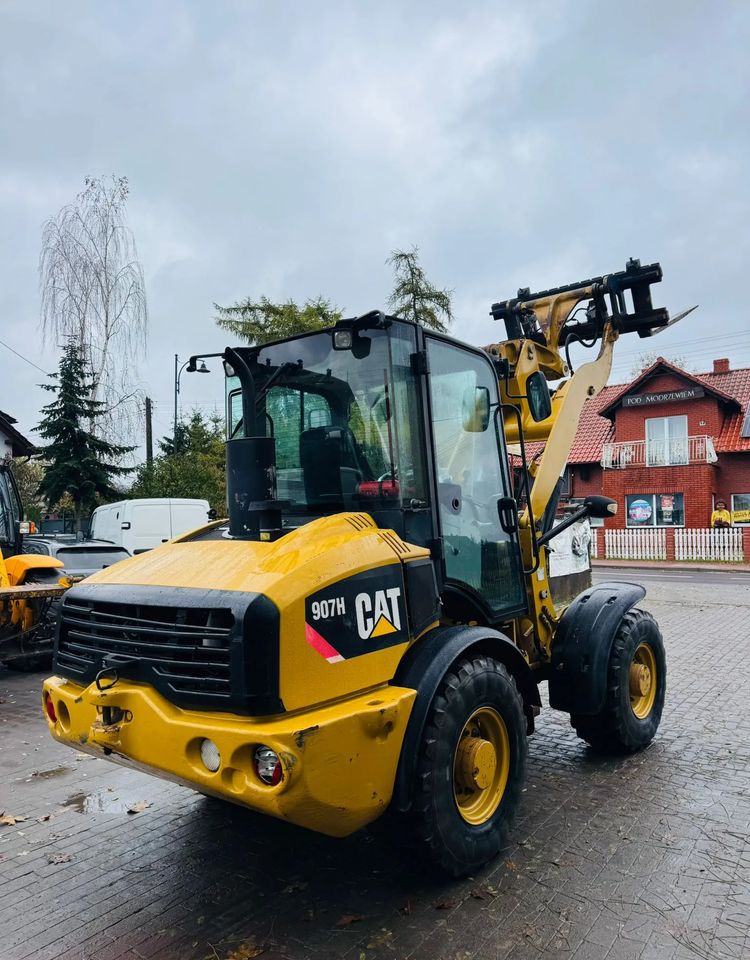 Pá carregadora de rodas Caterpillar 907H: foto 12