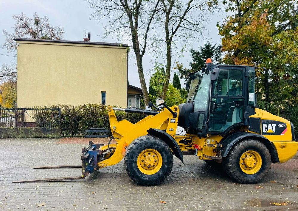 Caterpillar 907H - Pá carregadora de rodas: foto 4 Caterpillar 907H - Pá carregadora de rodas: foto 4