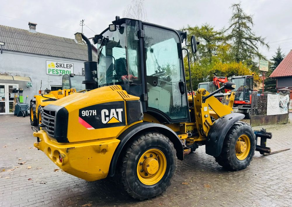 Pá carregadora de rodas Caterpillar 907H: foto 13