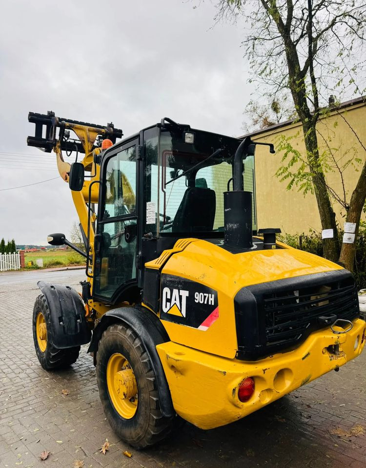 Pá carregadora de rodas Caterpillar 907H: foto 9