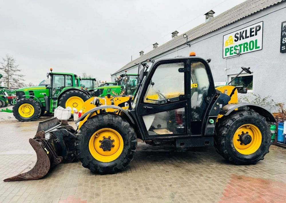 Caterpillar TH 336 - Empilhador telescópico: foto 3 Caterpillar TH 336 - Empilhador telescópico: foto 3