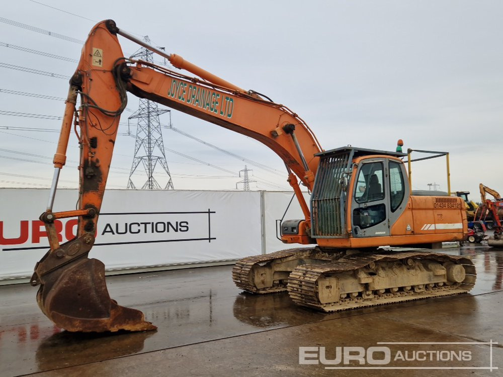 Doosan DX225LC - Escavadora de rastos: foto 1 Doosan DX225LC - Escavadora de rastos: foto 1