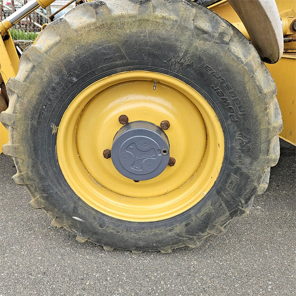 Retroescavadeira New Holland LB115: foto 37