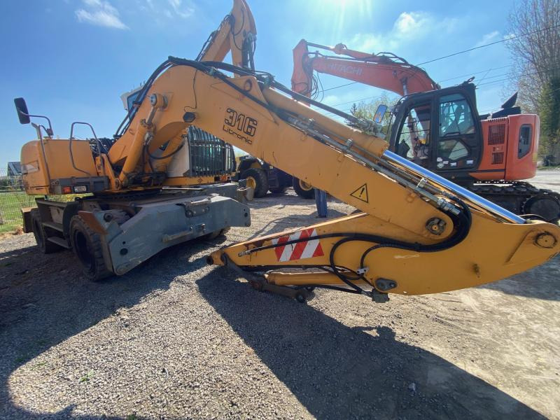 Liebherr A316Litronic - Escavadeira de rodas: foto 3 Liebherr A316Litronic - Escavadeira de rodas: foto 3