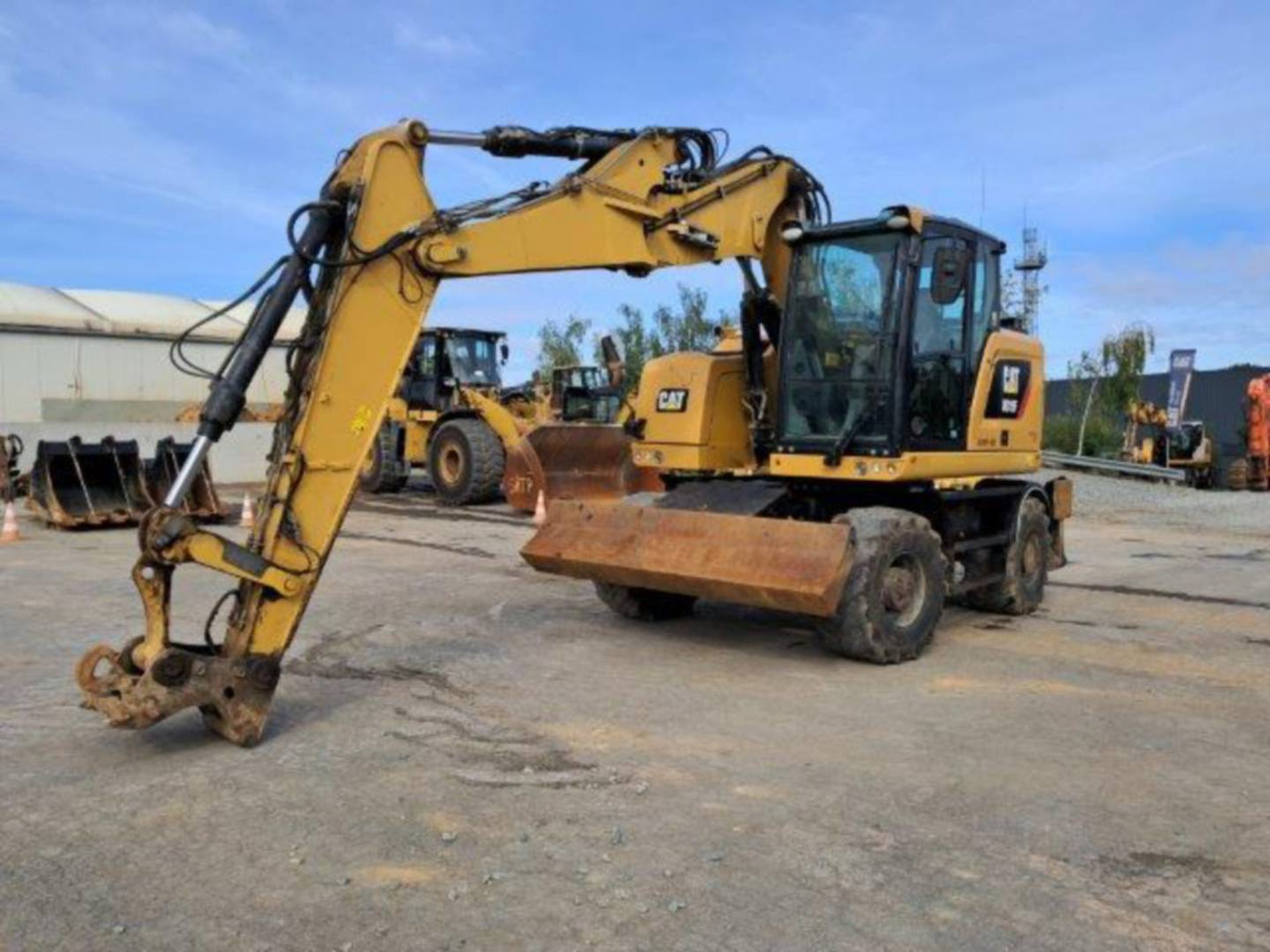 CAT M315F IVC - Escavadeira de rodas: foto 1 CAT M315F IVC - Escavadeira de rodas: foto 1
