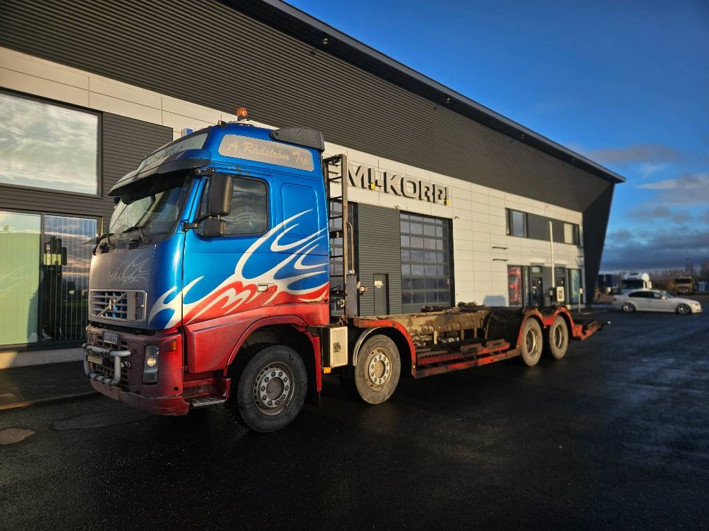 Volvo FH12 8x4 - Camião de transporte de madeira: foto 1 Volvo FH12 8x4 - Camião de transporte de madeira: foto 1