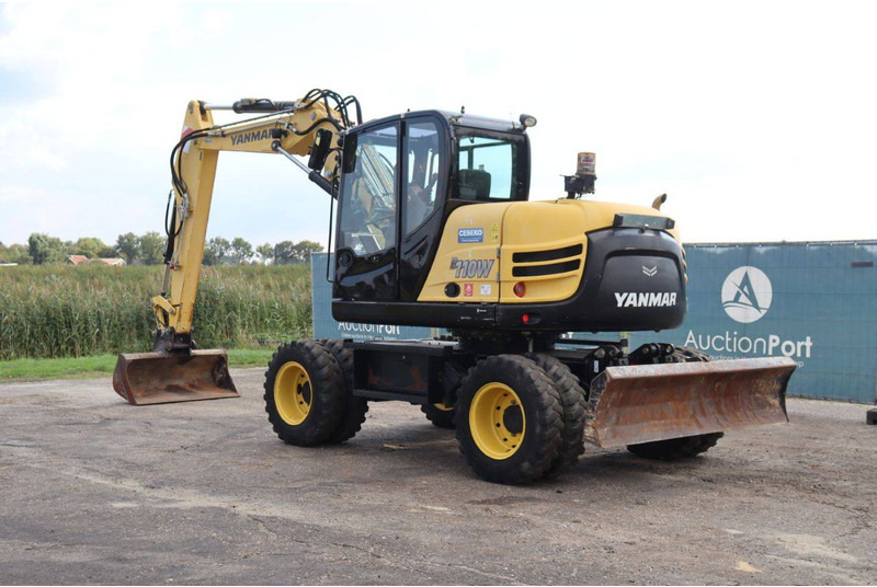 Yanmar B110W - Escavadeira de rodas: foto 4 Yanmar B110W - Escavadeira de rodas: foto 4