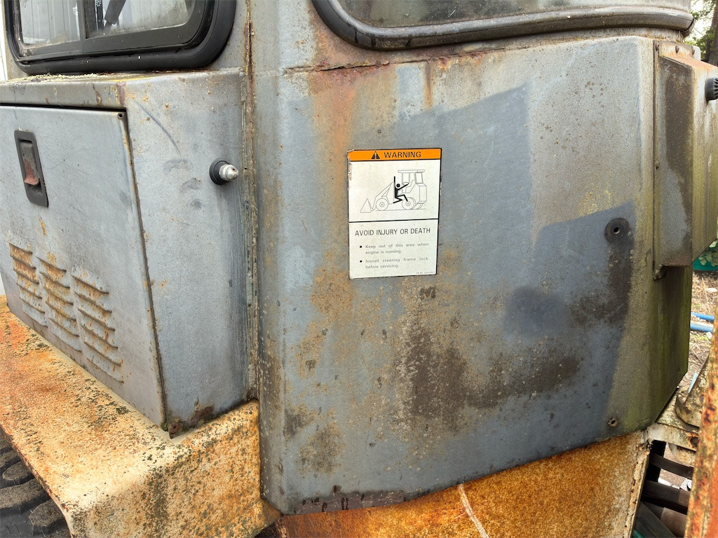 Pá carregadora de rodas Bobcat 2400: foto 32