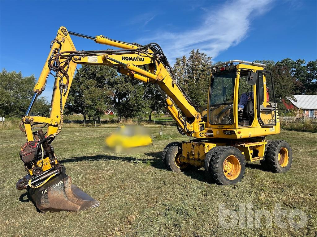 Komatsu PW95R - 7 redskap - Escavadeira de rodas: foto 1 Komatsu PW95R - 7 redskap - Escavadeira de rodas: foto 1