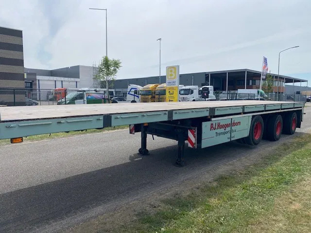 Floor robuuste vlakke oplegger ,uitschuifbaar, ,stuurassen, 20 mtr met stalen bodem/frame. kranenprofiel. - Semi-reboque plataforma/ Caixa aberta: foto 1 Floor robuuste vlakke oplegger ,uitschuifbaar, ,stuurassen, 20 mtr met stalen bodem/frame. kranenprofiel. - Semi-reboque plataforma/ Caixa aberta: foto 1
